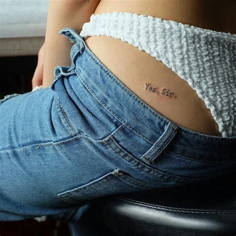 above butt tattoo|Tattoo above buttocks